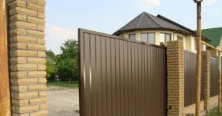 Купить откатные ворота из профнастила Боровичи, цена от 1765 руб.